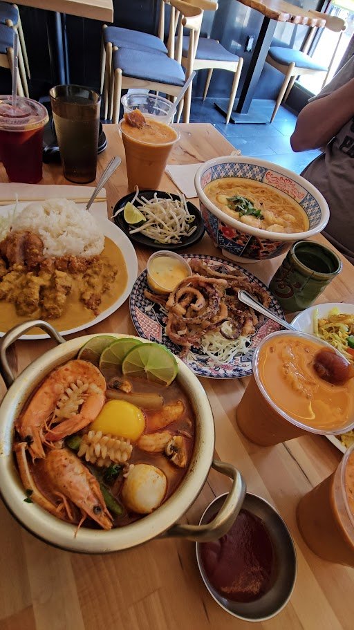 A bowl of ramen beside chopsticks.